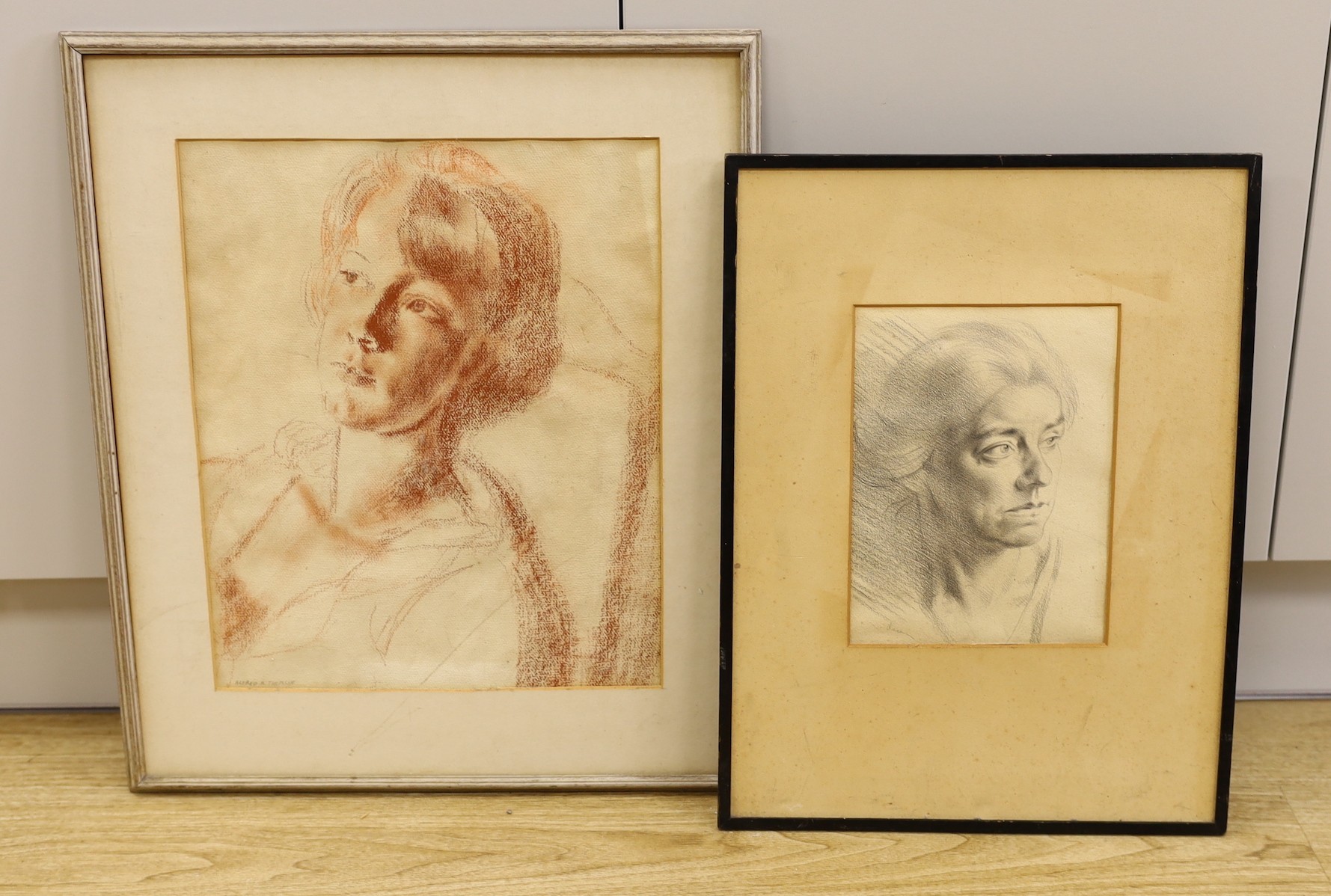 Alfred Reginald Thomson (1894-1979), sanguine chalk study of a woman and a pencil drawing by another hand, 42 x 34cm and 25 x 19cm